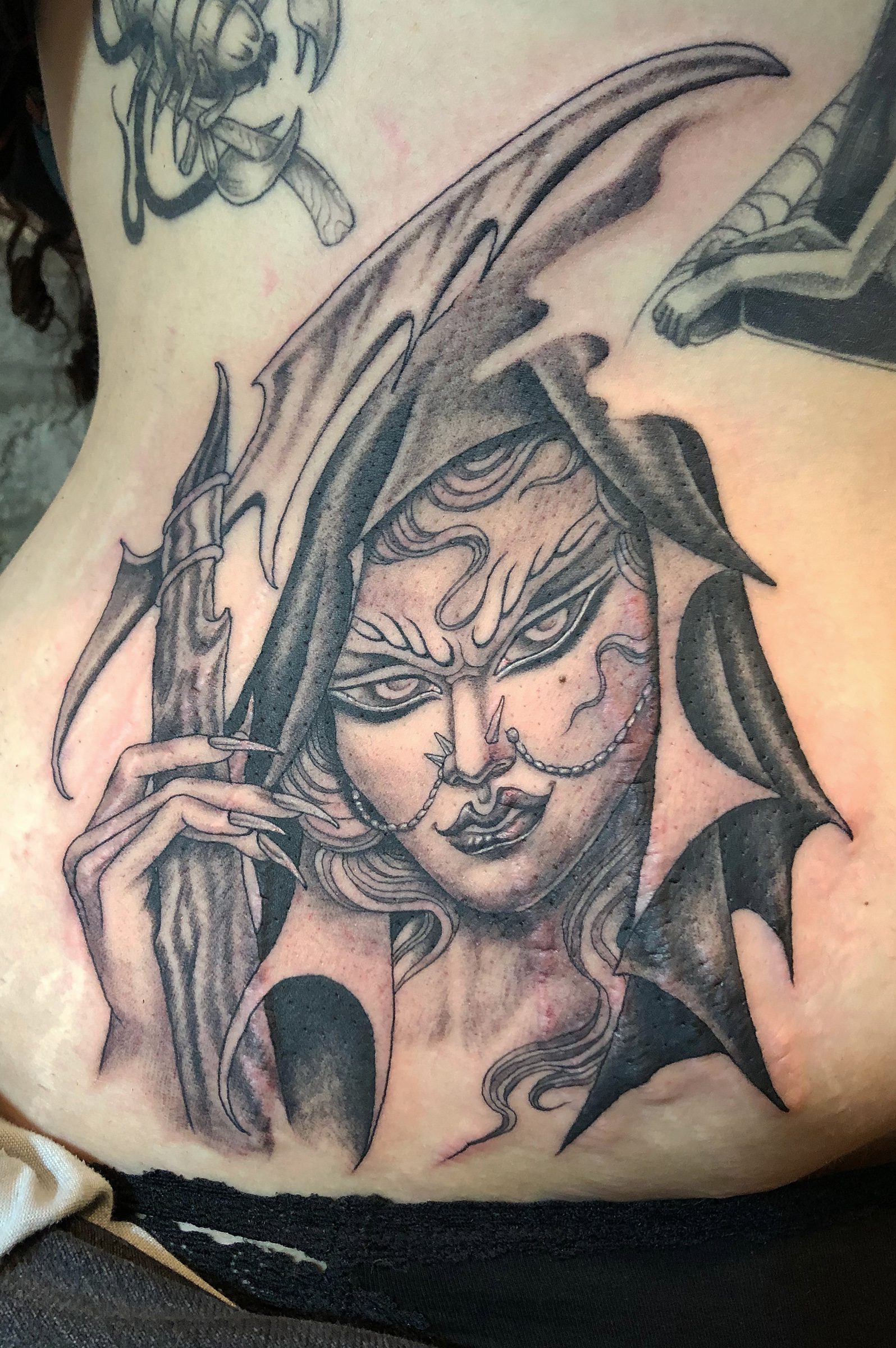 Image Alt /uploads/tattoo/small-scale/1785859292079-12.jpg